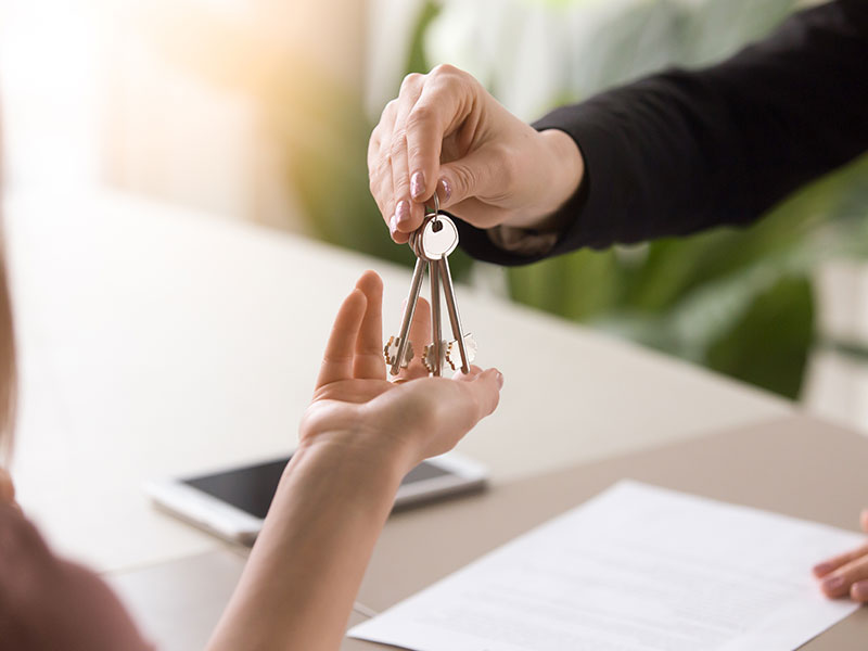 Agent Handing Over Keys